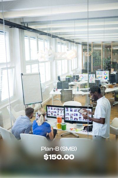 a group of people working on computers