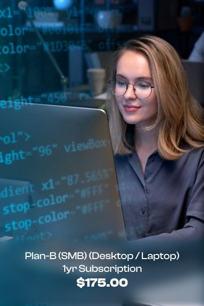 a woman looking at a computer screen