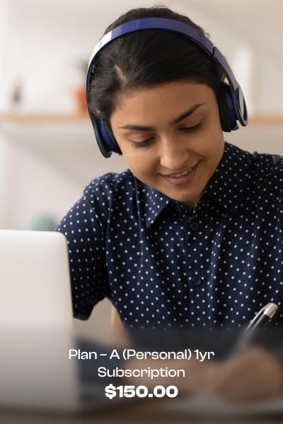 a woman wearing headphones and looking at a laptop